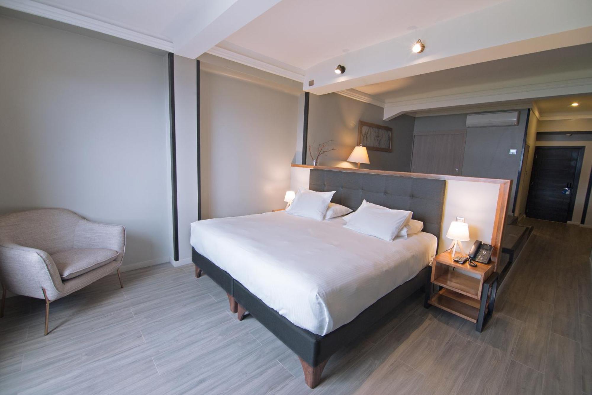 Hotel Enjoy Пукон Екстер'єр фото A room at the hotel